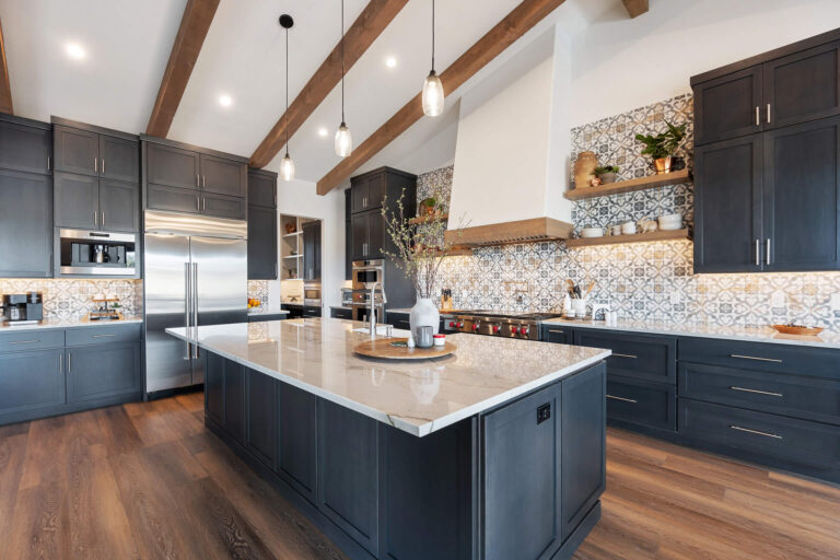 Modern kitchen with dark cabinetry.